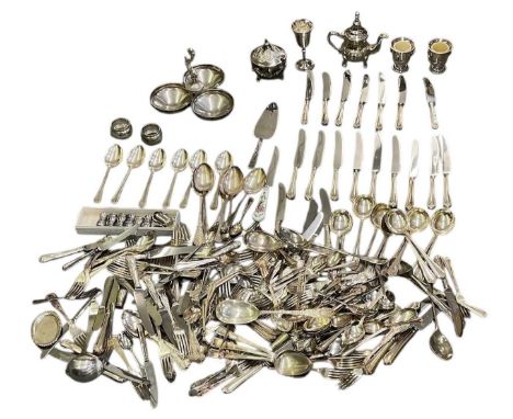 A large collection of assorted silver plated items, including table knives, table forks, table spoons, teaspoons, an ice crea