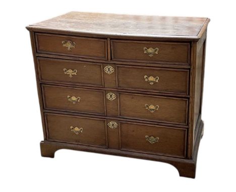 A 19th century oak chest of two short over three long drawers, raised on bracket feet, width 97cm, depth 55cm, height 85cm.