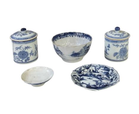 A pair of 19th century Chinese blue and white export ware porcelain lidded jars, both height 8.5cm, a blue and white saucer, 