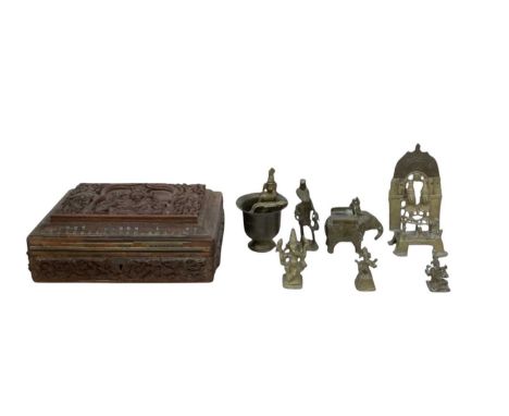 A group of seven Indian/Benin bronze figures including elephant and rider, three Ganesha figures, a Hindu shrine, height 16cm