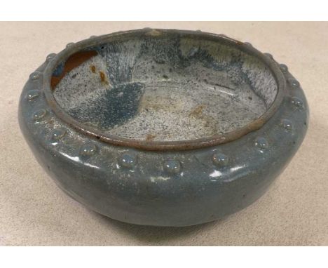 A Chinese robin's egg glazed bowl of archaic form, with raised stud detail and three scrolling supports, diameter 18cm.Proven