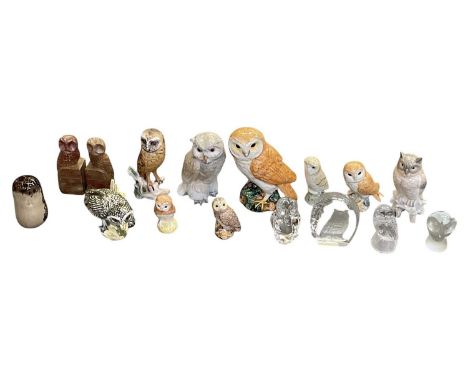 A collection of approximately sixteen ceramic, hardstone, glass and porcelain owls, including four Beswick, Goebbel, Mack, Br