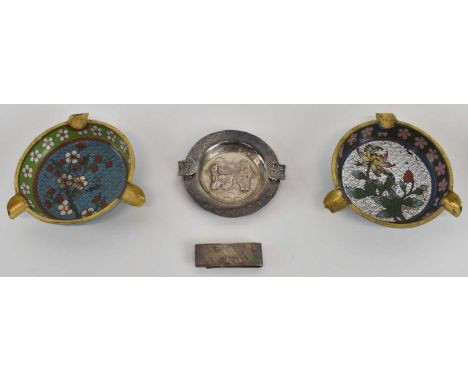 Two early 20th century Chinese gilt metal cloisonne enamelled circular ashtrays, both decorated with central panels depicting