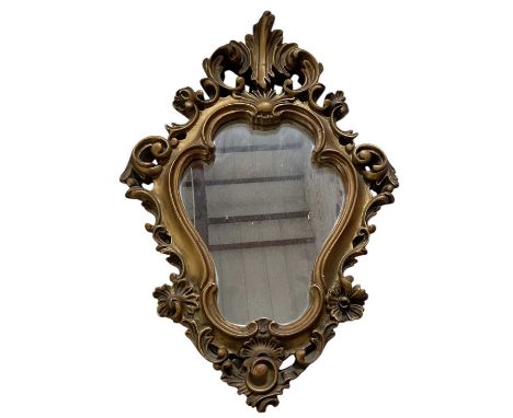 A modern gilt framed French ormolu type oval wall mirror, height 50cm, width 34cm.