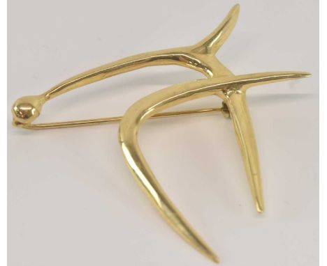 A 14ct yellow gold brooch modelled as a Hebrew symbol, 5 x 5.5cm, approx weight 11.3g.