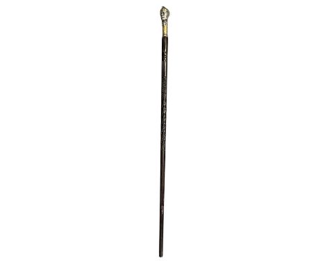 An unusual early 20th century walking stick, the handle in the form of a gentleman's head and shoulders, the head shown with 