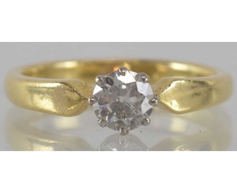 An 18ct yellow gold diamond solitaire ring, the central stone approx 0.7ct, size P, approx 5g.