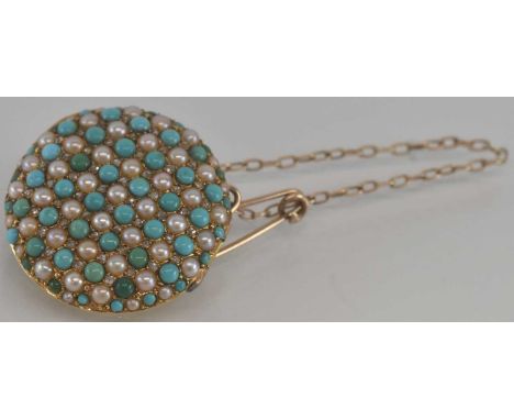 An 18ct gold seed pearl and turquoise circular brooch, with safety chain, diameter 2.5cm, approx 4.8g.
