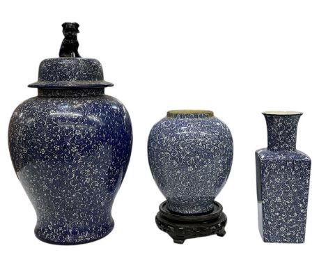 A large early 20th century blue and white lidded temple jar, surmounted with Dog of Fo decoration in the Chinese style, heigh