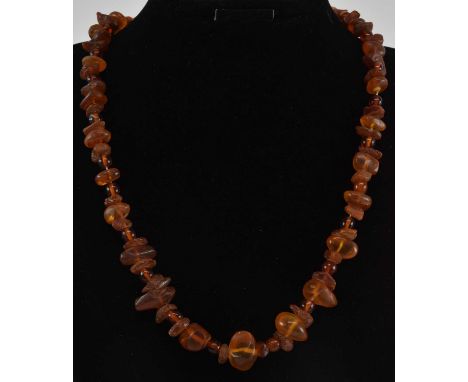 A rough cut amber bead single strand necklace, length approx 50cm.