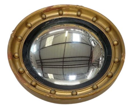 An early to mid 20th century circular gilt framed convex wall mirror, diameter approx 41.5cm.