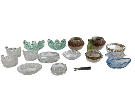 A collection of 19th century and later salts including a set of four Georgian cut glass salts, a pair of stoneware white meta