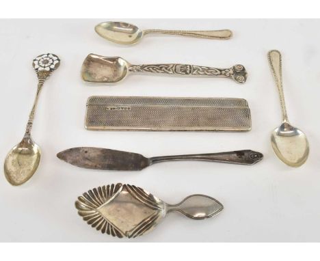 E J TREVITT &amp; SONS; a George V hallmarked silver comb, Chester 1934, length 11cm, (af), a George V hallmarked silver butt
