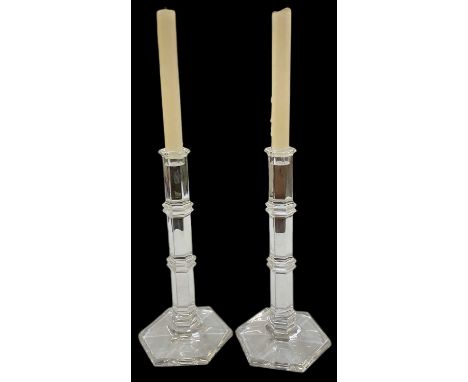 TIFFANY &amp; CO; a pair of modern crystal glass candlesticks, with ribbed decoration, height 18cm.