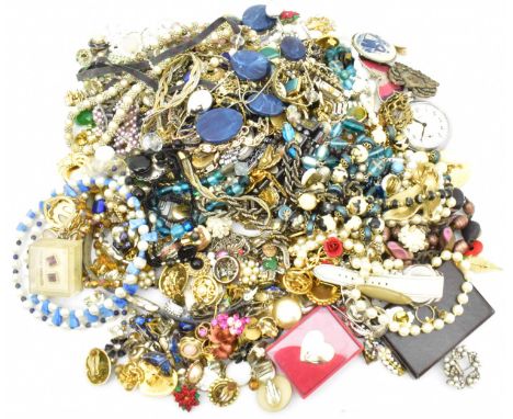 A quantity of costume jewellery, including bracelets, brooches, rings, earrings, clip on earrings, necklaces, simulated pearl