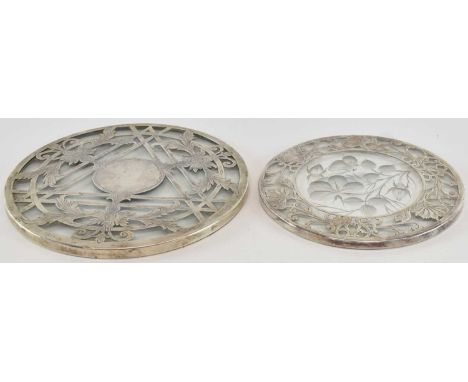 A pair of sterling silver mounted glass table coasters, diameters 18cm and 15cm (2).