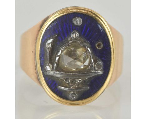 A yellow metal blue enamelled Masonic signet ring, the centre set with rough old cut diamond, approx 0.5ct, size P, approx 4.