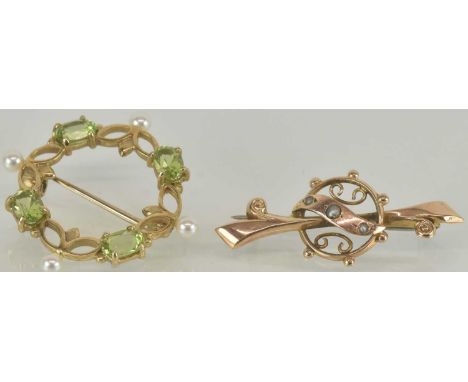 Two 9ct gold brooches, comprising a circular open brooch set with four green stones interspersed by four small seed pearls, d