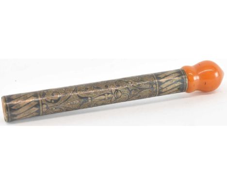 A 19th century Turkish Ottoman white metal pipe, with butterscotch amber effect top, length 14cm.