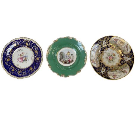 Three 19th century English porcelain plates including a mid 19th century hand painted crest plate, decorated with birds among