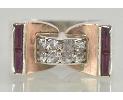 A 1930s Art Deco white metal ruby and diamond ring, size L, approx 8.8g.