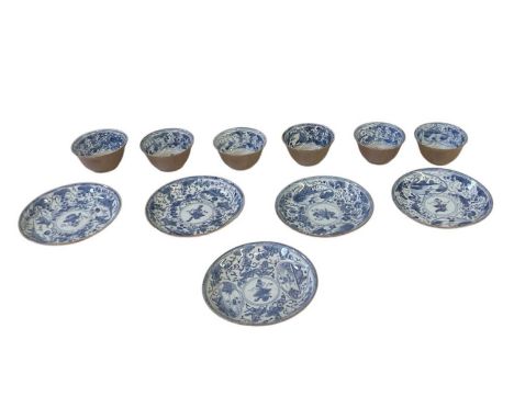 A set of six Chinese blue and white brown ground tea bowls and five saucers, diameter of saucers 11.5cm, diameter of tea bowl