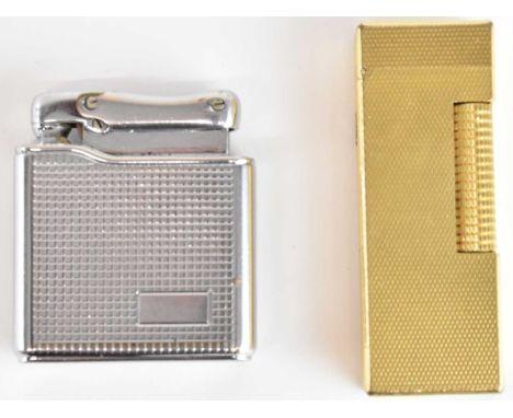 DUNHILL; a gold plated Rollagas lighter with signature barley pattern and a further 'Colibri Monogas' lighter (2).
