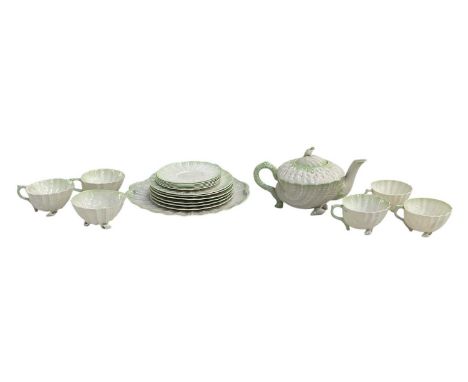 BELLEEK; an early 20th century 'Neptune' six setting tea service comprising teapot, five teacups, six saucers, six side plate