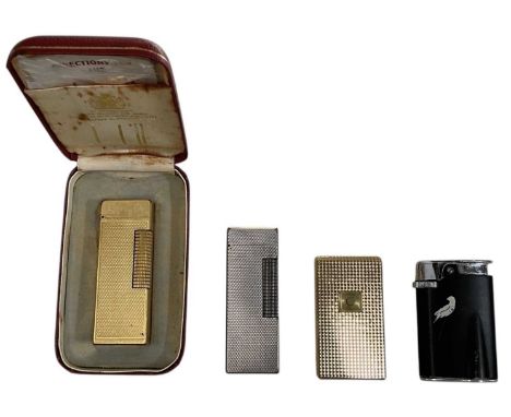 Four collectable vintage lighters, comprising two Dunhill examples of similar design and with engine turned decoration, one g