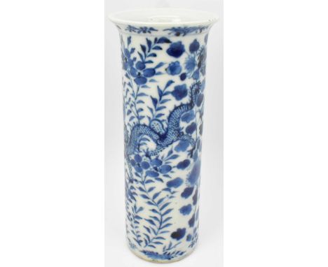A 19th century Chinese cylindrical vase, with flared neck and blue painted dragons within floral decoration, four character m