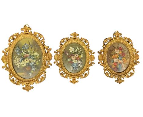 UNATTRIBUTED; a modern oval portrait miniature, still life of flowers, 11 x 8cm, in elaborate gilt metal frame, and a pair of