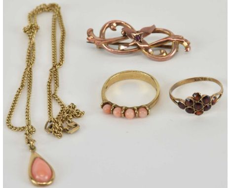 Four items of 9ct gold jewellery comprising a ring set with four small pink coral beads, size M, a small garnet cluster ring,