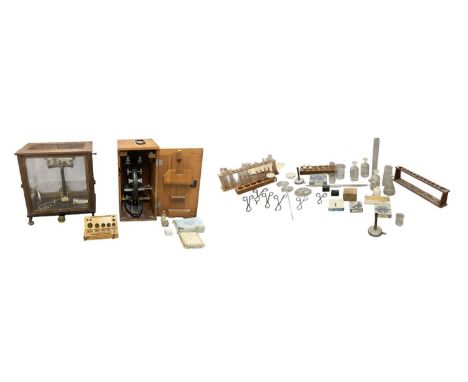 BAIRD &amp; TATLOCK LTD OF HATTON GARDEN, LONDON; a pair of early 20th century cased chemist balance scales, height 40cm, wid