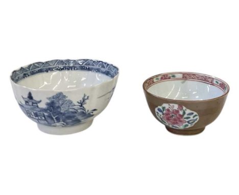 A Chinese blue and white porcelain bowl, the exterior decorated with pagodas and boats amongst landscape, diameter 14cm, and 