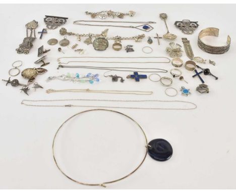 A quantity of 925 silver and white metal jewellery including two charm bracelets, bangle, earrings, rings, 800 grade teaspoon