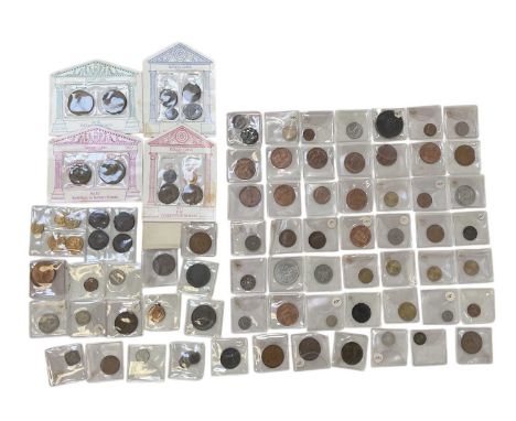 A collection of assorted all world coinage, including threepences, pennies, Britannia pennies, Canadian coins, European coins