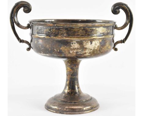 WILLIAM HUTTON &amp; SONS; an Edward VII hallmarked silver twin handled pedestal bowl, Birmingham 1907, height 15cm, width 17