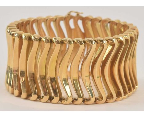 An 18ct yellow gold chunky wide bracelet, length 20.5cm, width 3.5cm, approx 93.4g.