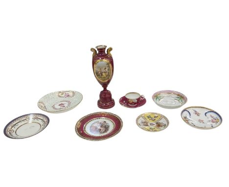 An 18th century Vienna hand painted porcelain twin handled pedestal vase, the central panel decorated with lady and cherub, h