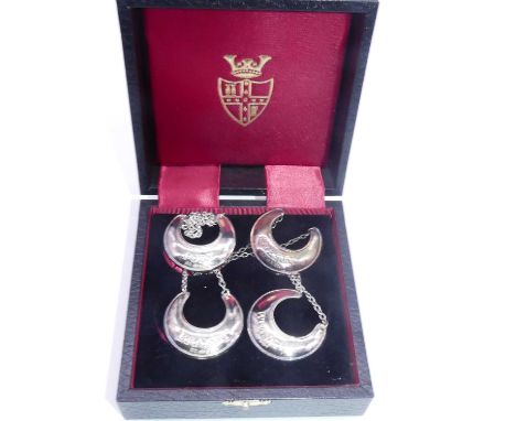 A set of four modern silver decanter collars, each of horseshoe shape and annotated for Port, Sherry, Brandy, and Whisky, in 