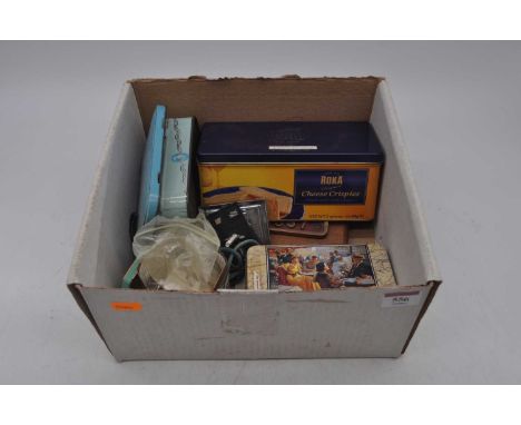 A box of miscellaneous items to include enamel badges