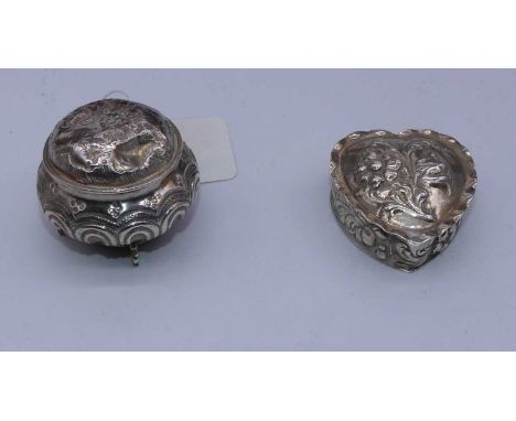 An early 20th century trinket box, of heart shape, having repousse floral decoration; together with one other early 20th cent