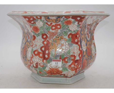 A Chinese Republic period jardiniere, enamel decorated with flora and fauna, three-character enamel mark to the underside, he