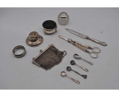 A small collection of miscellaneous items to include an early 20th century ladies silver chain link purse, a silver and torto