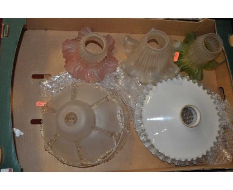 A collection of vintage glass light shades