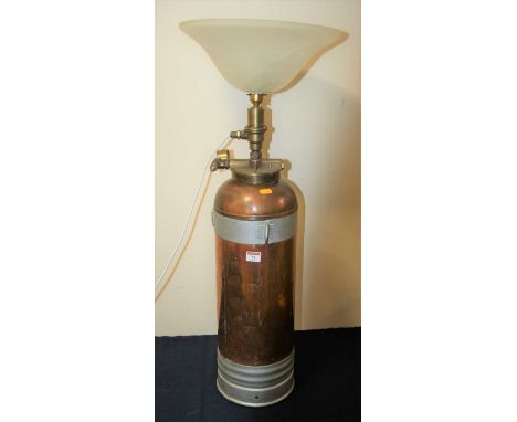 A vintage copper fire extinguisher, converted into a lamp, height 88cm overall