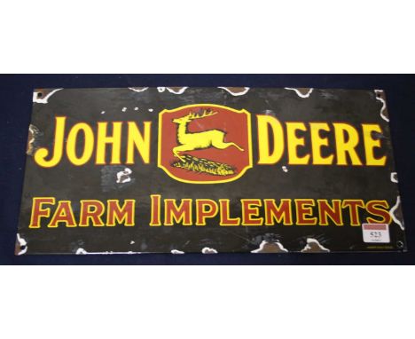 A reproduction enamel advertising sign for John Deere farm implements, 21 x 45cm