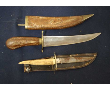 A Victorian pocket knife, the folding steel blade marked John Petty &amp; Sons of Sheffield, with two-piece horn grip; togeth