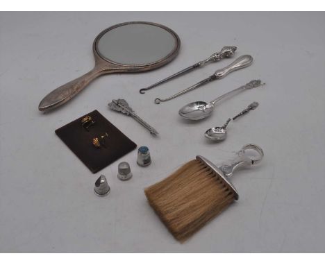 A collection of miscellaneous items to include white metal and enamel thimble, silver backed dressing table mirror, silver ha