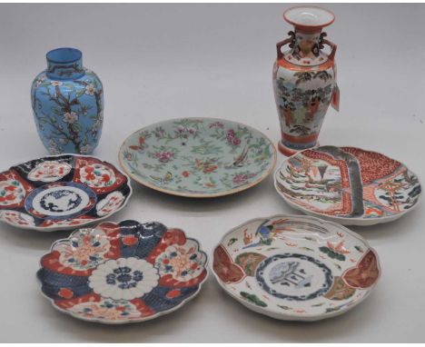 A collection of eastern ceramics to include an enamel decorated celadon plate, arita dishes, and a satsuma vase